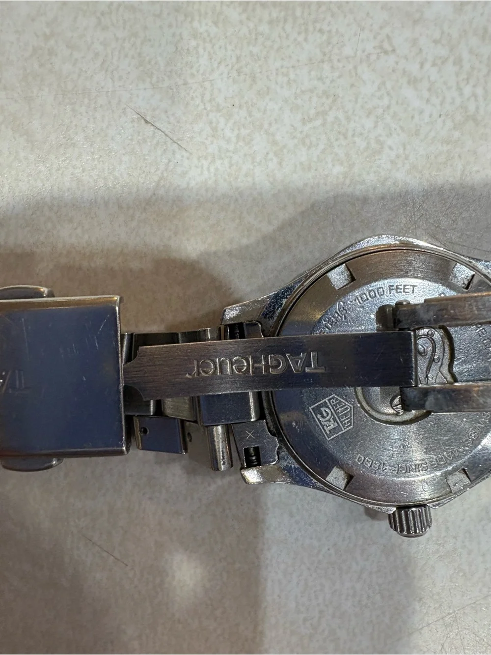 Tag Heuer Silver Dial Aquaracer Watch with Red Logo